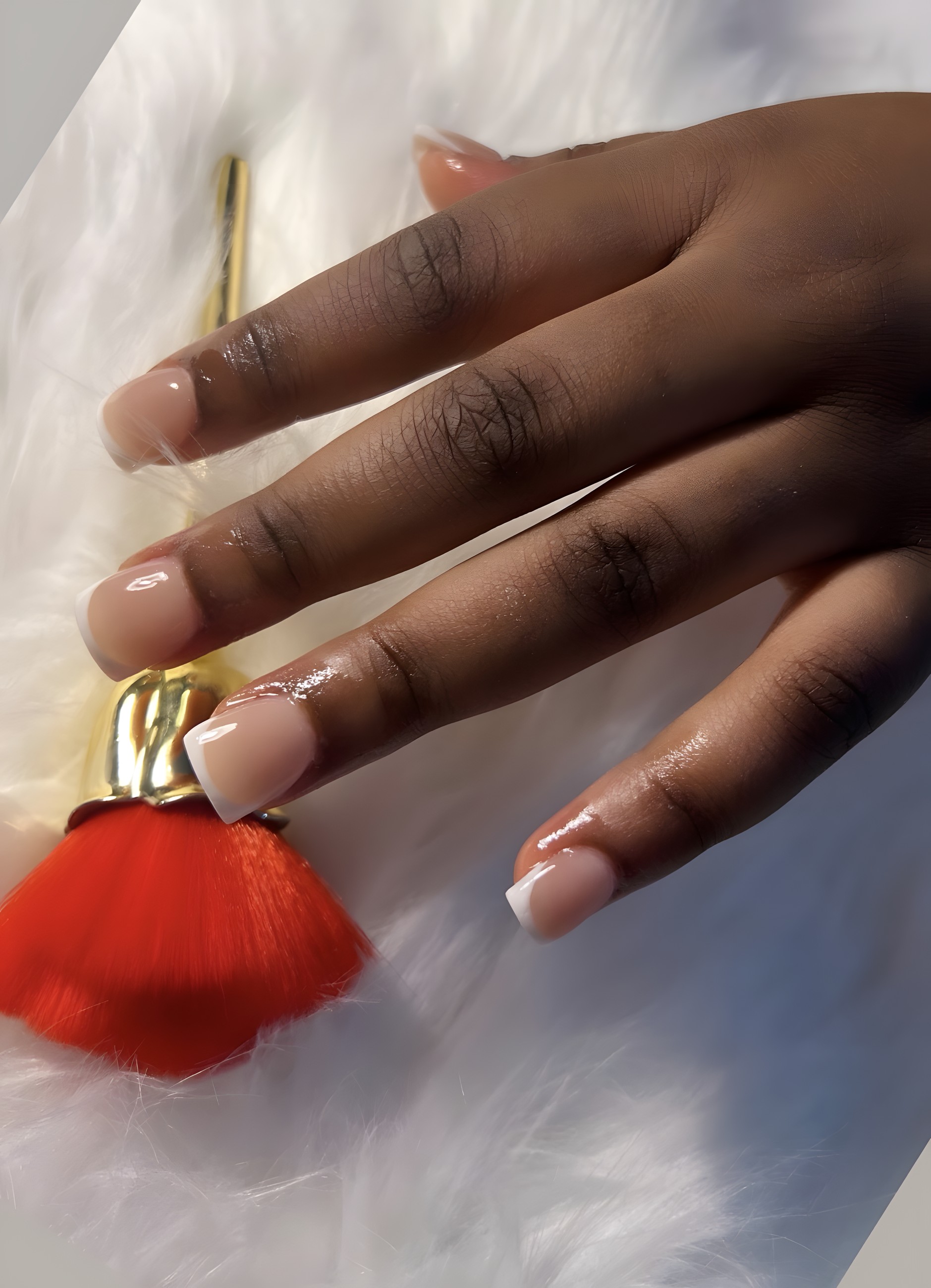 Soft natural French manicure with a fine white tip